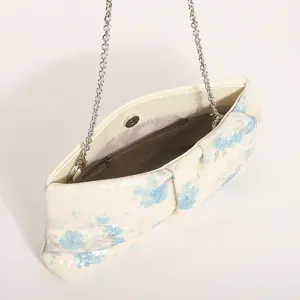 Elegante borsa pochette con paillettes floreali e catena, stile pittura a olio retrò.