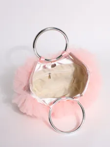 Interior view of pink ruffled tulle handbag with silver metal handles and zip pocket