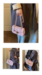 Detailed view of the pink quilted chain bag styled with a dark coat and jeans.