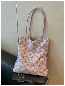 Macro detail showing the iridescent scale sequin embroidery on a purple sequin shoulder bag