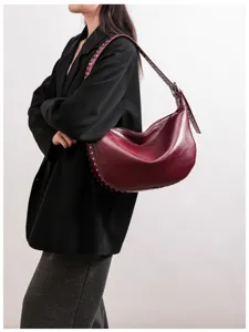 Vintage red studded hobo shoulder bag for women, large capacity faux leather underarm bag.