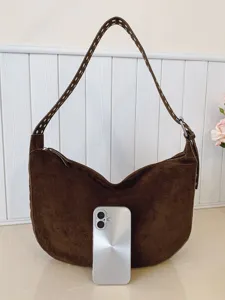 Vintage brown suede hobo bag for women, stylish underarm shoulder bag with rivet strap.