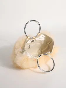 Interior view of a sweet style pleated tulle handbag with metallic silver ring handles.