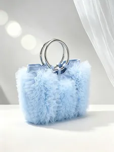 Elegant light blue tulle ruffled handbag with silver ring handles detail