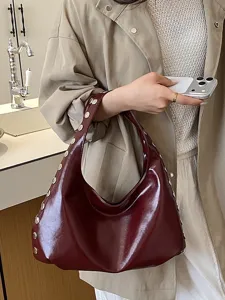Stylish wine red shiny PU leather underarm bag with punk-style silver rivets