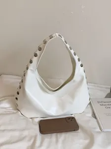 Fashionable white glossy PU underarm bag with decorative silver rivets in punk style