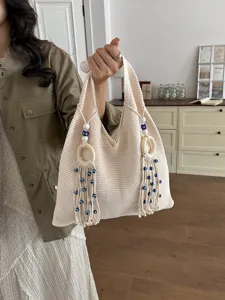 Böhmische Sommer-Stricktasche mit blauen bösen Augen-Quasten und Holzring-Dekoration