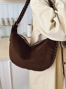 Studded suede motorcycle shoulder bag for women, casual slouchy oversized hobo dumpling handbag.