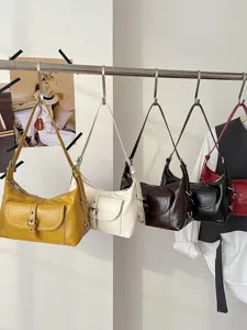 Retro oil wax leather underarm bag with front buckle pocket design in various colors for women