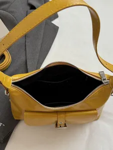 Vintage yellow oil wax leather underarm bag with pocket design for women
