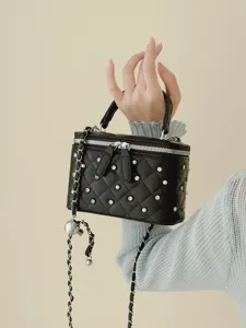 Elegant black quilted box bag with white pearls, rhinestones and silver metal chain strap.