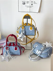 Stylish denim color-blocking bowling bag with star charm and top handles in three colors