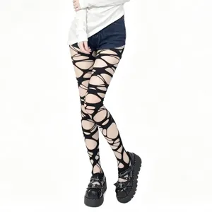 Medias de rejilla estilo punk gótico con agujeros irregulares y diseño desgastado