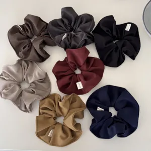 Set de siete coleteros de tela de alta calidad en varios colores lisos para el cabello