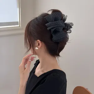 Elegant large black polka dot organza hair claw clip for voluminous bun and updo hairstyles