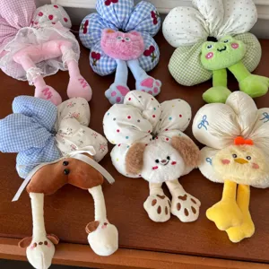 Collection of cute plush flower hair scrunchies with cartoon animal faces and dangling legs