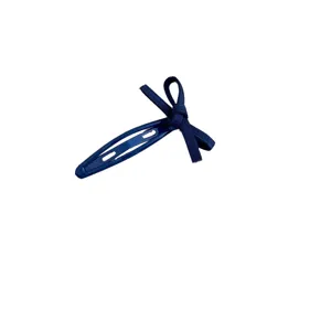 Sweet navy blue snap hair clip featuring a ribbon bow design for cute side hair styling