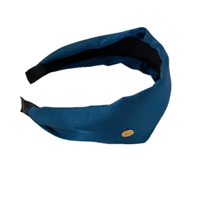 Vintage padded blue wide headband with gold Smile Happy label for daily hair styling