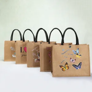 Showcase of eco-friendly jute linen tote bags with colorful butterfly and slogan prints