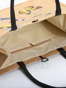 Detail of jute butterfly tote bag interior with zipper pocket and lining