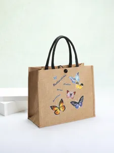 Detailed view of eco-friendly jute tote bag featuring colorful butterfly prints and text.