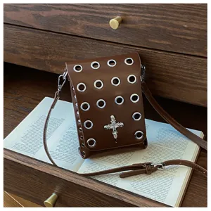 Dark gothic brown small crossbody bag with silver skull cross and metal grommets