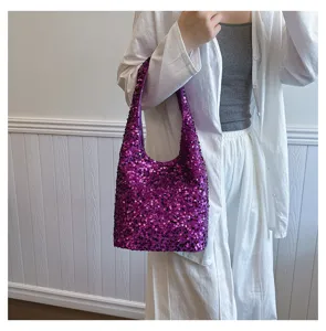 Detail view of a stylish women's punk shoulder bag featuring vibrant purple sequins.