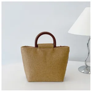 Elegante borsa a mano in lino intrecciato con manico circolare in resina, stile sobrio