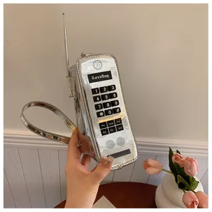 Unique metallic silver retro phone-shaped crossbody bag for women
