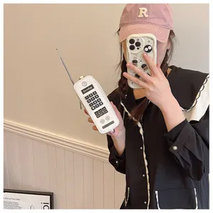 Creative white vintage brick phone shaped crossbody bag with tactile buttons and antenna detail