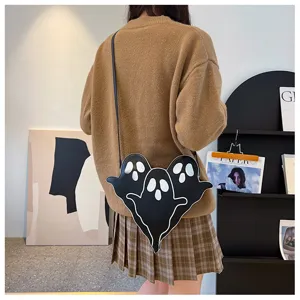 Playful Halloween ghost shaped crossbody bag in black for women lifestyle detail view