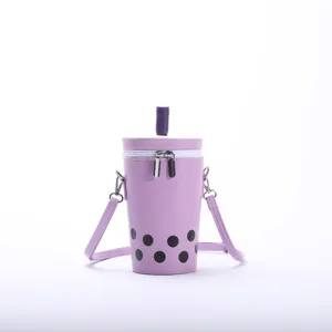 Detailed view of a cute purple bubble tea cup shaped crossbody bag with straw design