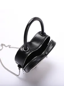 Black heart-shaped handbag with round handle and silver chain strap for women chic daily use
