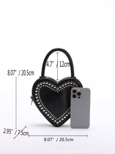 Black heart-shaped handbag with silver metal studs and handle, stylish crossbody bag.