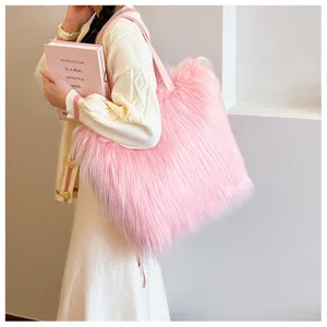 Chic pink long-hair faux fur tote bag, a large shaggy shoulder bag for fashion looks