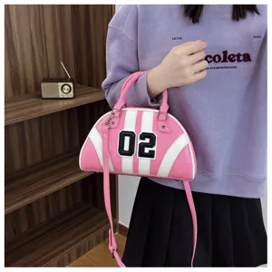 Pink and white patchwork bowling bag with number 02 decoration detail