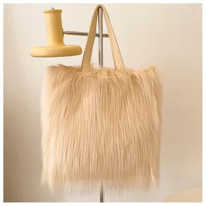 Detailed view of fluffy faux fur tote bag with long shaggy hair and smooth straps