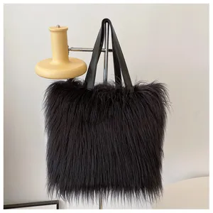 Black faux raccoon fur tote bag with long plush hair and glossy black straps