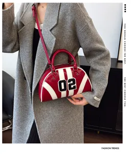 Detailed view of red color-block bowling handbag with number 02 patch