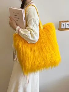 Vibrant bright yellow long faux fur shaggy tote bag with shoulder strap lifestyle view