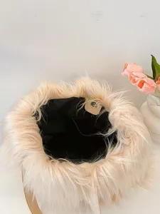 Top view of plush faux fur tote bag with magnetic clasp and black lining