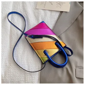 Detailed view of colorful metallic PU leather and blue handle on a small bucket bag
