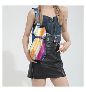 Trendy rainbow metallic cat-shaped crossbody bag shown worn by a model in detail view.