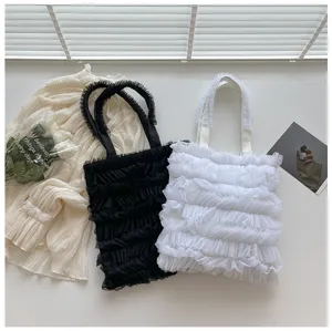 Elegant pleated ruffle mesh tote bags in black and white with fairy-style design.
