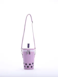 Unique lavender milk tea cup shaped crossbody bag with straw detail and boba pattern
