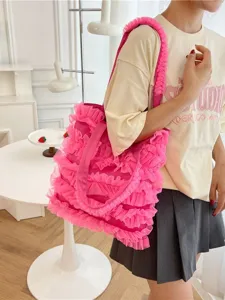Vibrant pink ruffled tote bag with sweet lace mesh design for women lifestyle view