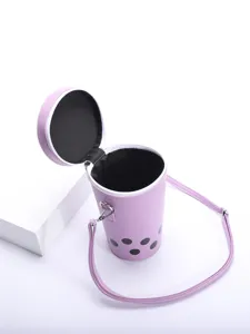 Detailed view of lavender bubble tea shaped crossbody bag showing black interior lining.