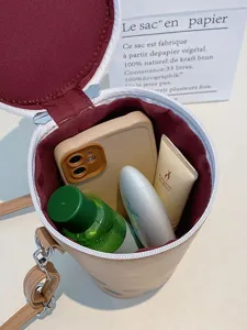 Creative milk tea cup shaped crossbody bag showing spacious interior storage capacity
