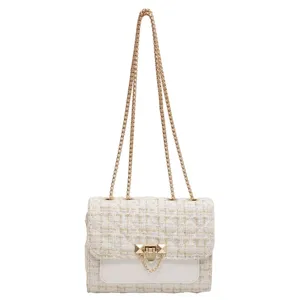 Elegant white tweed square chain bag for women with decorative gold hardware accents
