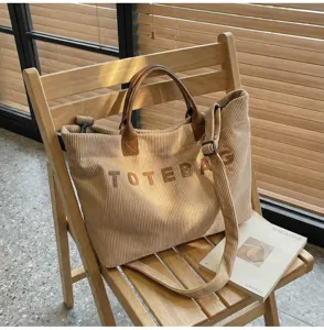 Casual corduroy tote bag for women, large capacity shoulder handbag for daily commute and shopping.